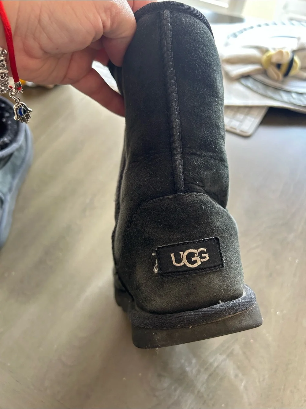 Well loved UGG Black Suede Shearling Boots